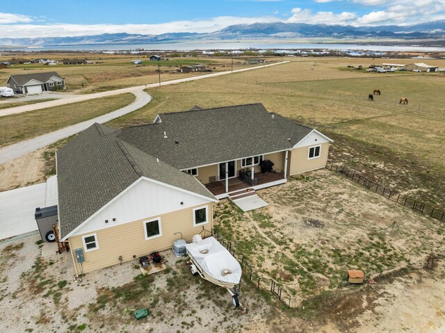 drone / aerial view featuring a mountain view