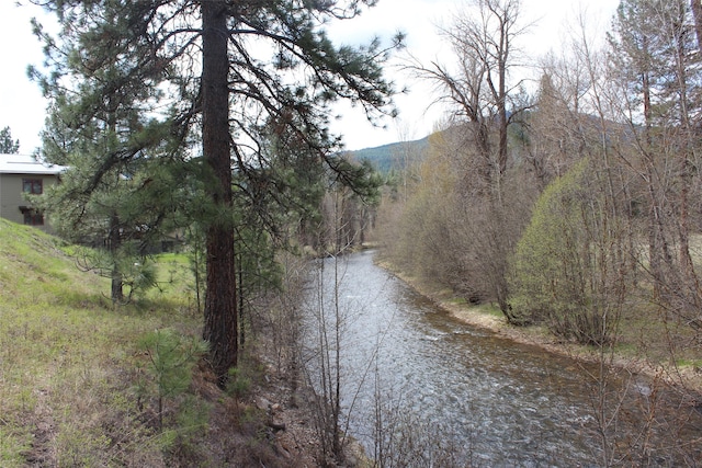 view of road featuring a water view