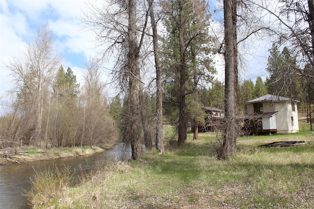 view of yard with a water view