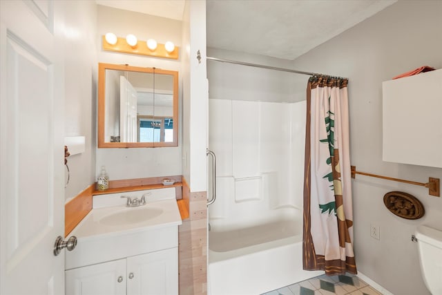 full bathroom with vanity, toilet, shower / tub combo with curtain, and tile patterned floors