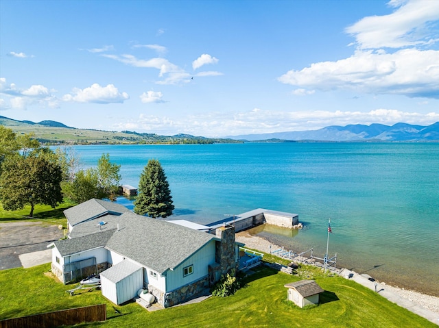 bird's eye view featuring a water and mountain view