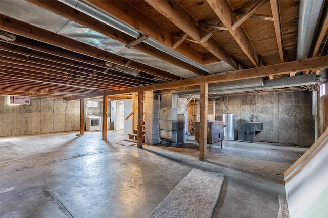 basement featuring heating unit