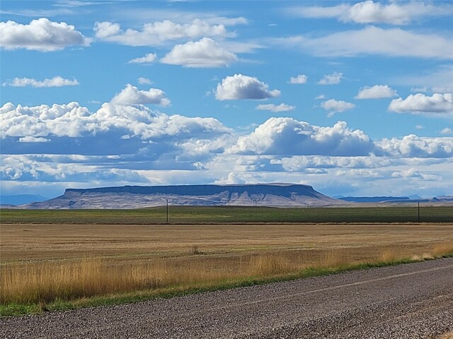 property view of mountains with a rural view