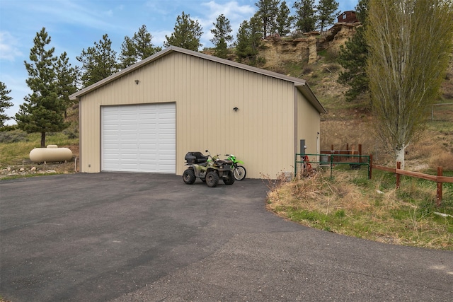 detached garage with fence