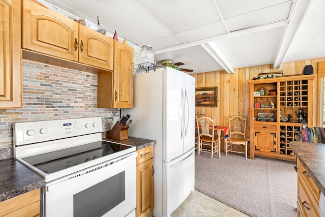 kitchen featuring ceiling fan, white appliances, and light tile floors