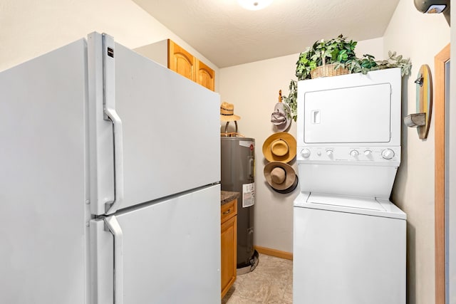 washroom with stacked washer / dryer, electric water heater, and light tile flooring