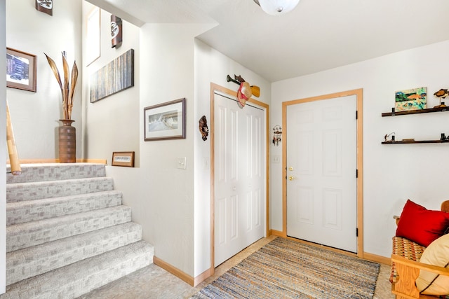 view of tiled foyer entrance