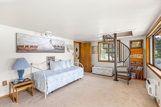 bedroom featuring light carpet