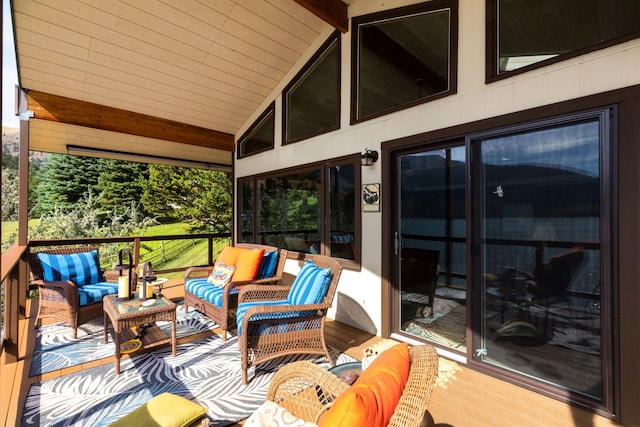 wooden terrace featuring an outdoor hangout area