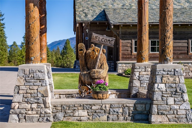 details with a high end roof and a mountain view