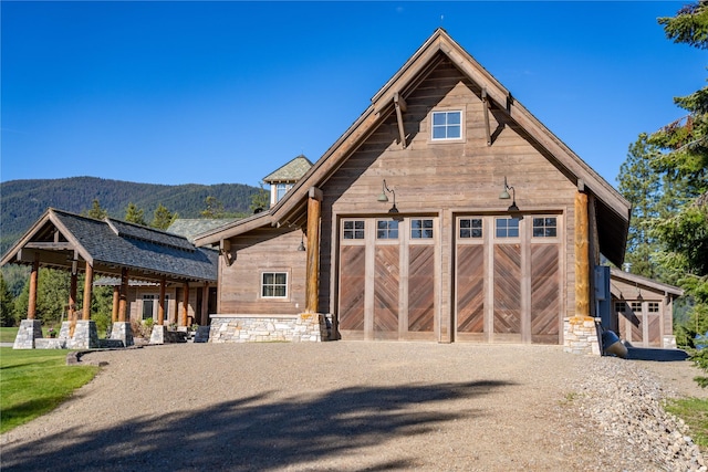 exterior space featuring a mountain view