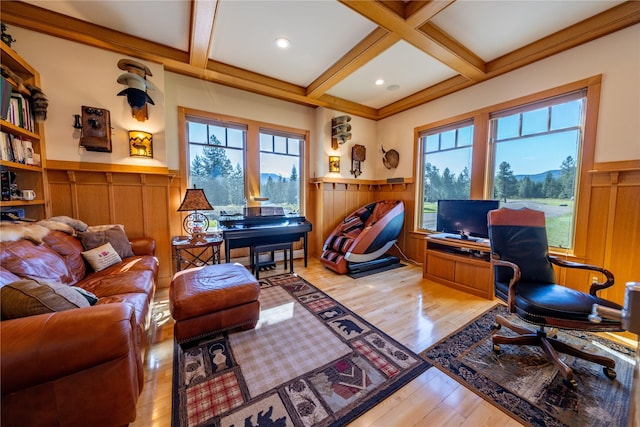 office with a wainscoted wall, beamed ceiling, coffered ceiling, and plenty of natural light