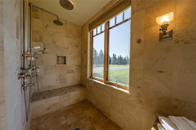 full bathroom featuring tiled shower