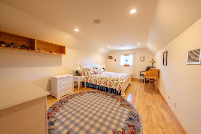 bedroom with light wood-style floors, baseboards, vaulted ceiling, and recessed lighting