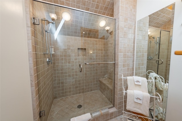 full bathroom with a shower stall