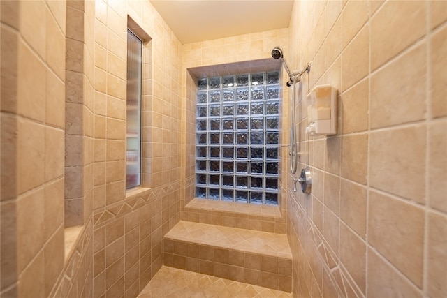 full bathroom with tiled shower