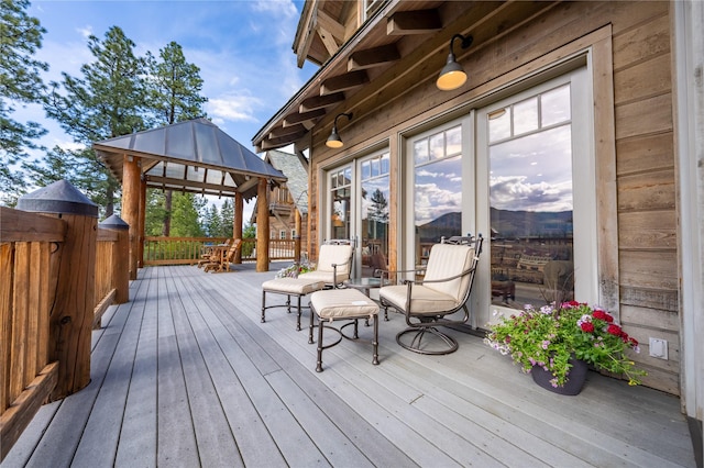 wooden terrace with a gazebo