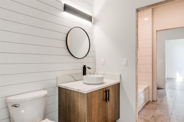 209 Mannington St, Kalispell, MT 59901 - bathroom with vanity, a bathtub, and tile patterned flooring
