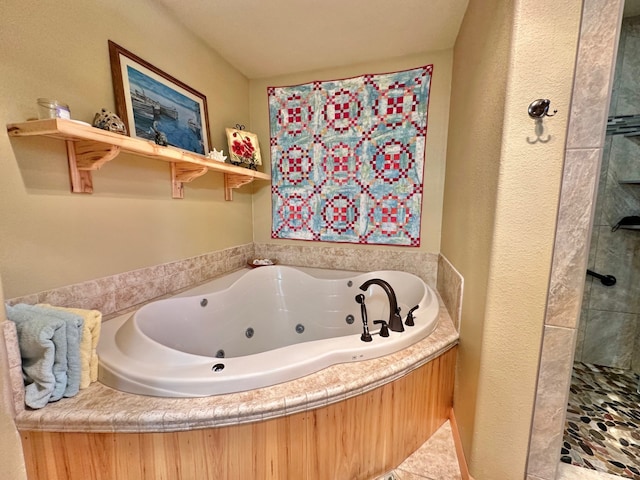 bathroom with tile patterned flooring and independent shower and bath