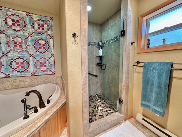 bathroom featuring tile patterned flooring, a baseboard radiator, and shower with separate bathtub