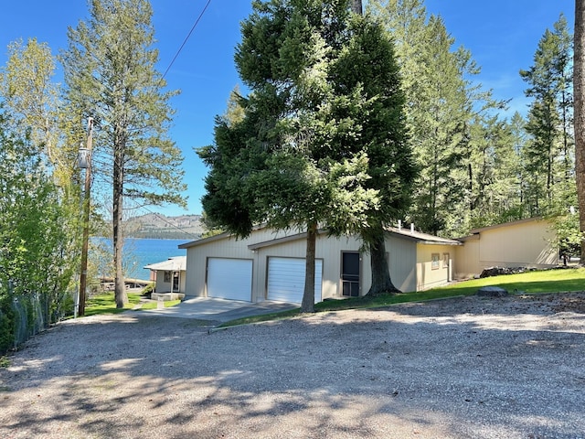 garage featuring a water view