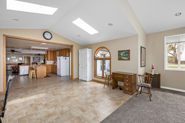 carpeted bedroom with ceiling fan and a textured ceiling