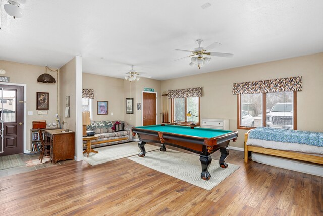 playroom featuring dark wood-type flooring, billiards, and ceiling fan