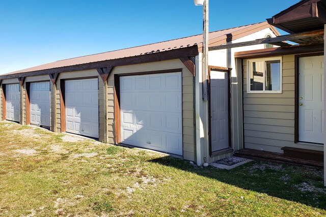 garage featuring a workshop area and a garage door opener