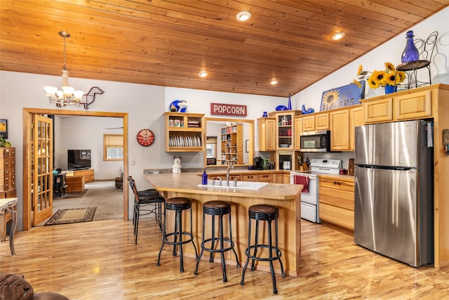 kitchen featuring sink, wooden ceiling, stainless steel appliances, vaulted ceiling, and light brown cabinetry