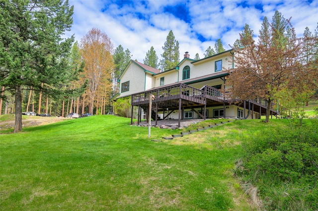 view of yard featuring a wooden deck