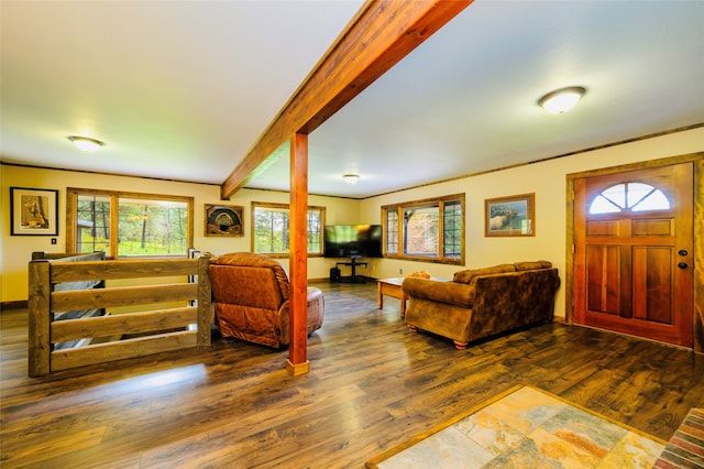 living room with beamed ceiling and hardwood / wood-style floors