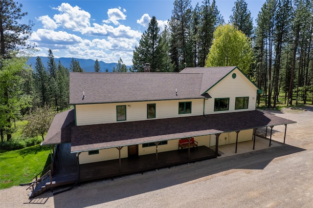 view of front of house featuring a mountain view