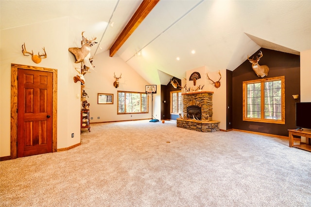 living room featuring carpet flooring, vaulted ceiling with beams, and a fireplace