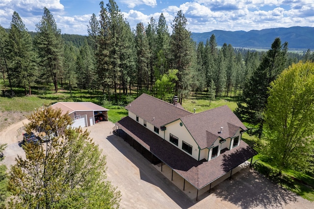 birds eye view of property featuring a mountain view