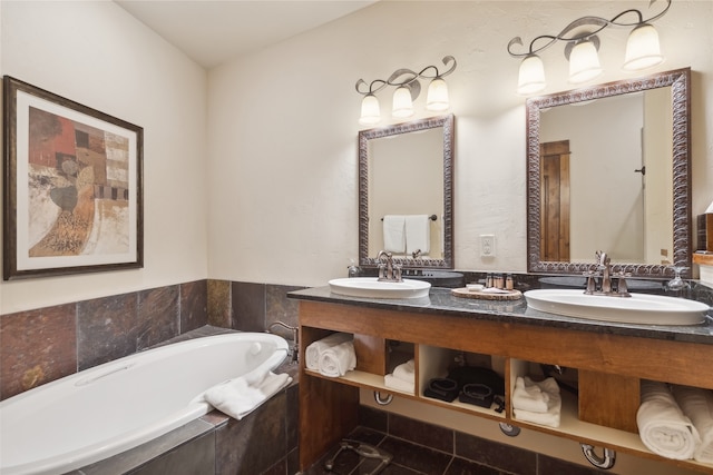 bathroom with tile floors, tiled bath, and double sink vanity