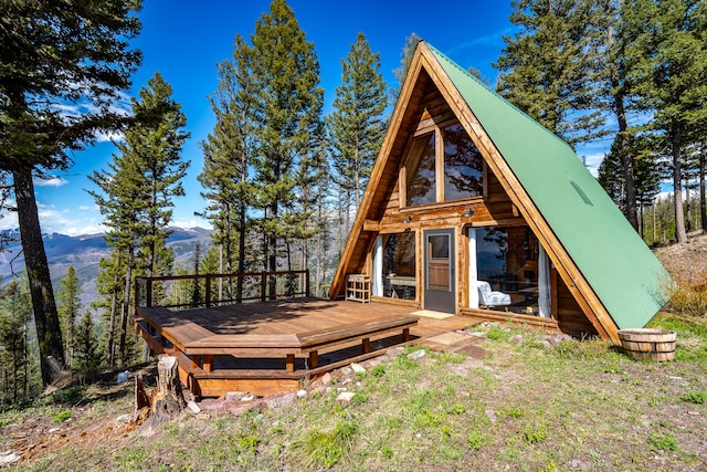 exterior space featuring a mountain view