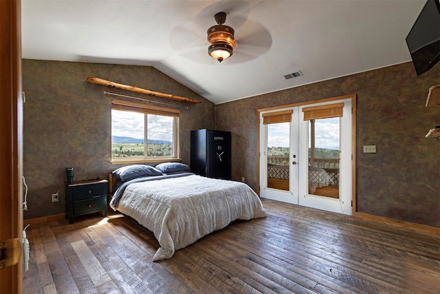 bedroom featuring access to outside, ceiling fan, dark wood-type flooring, french doors, and lofted ceiling