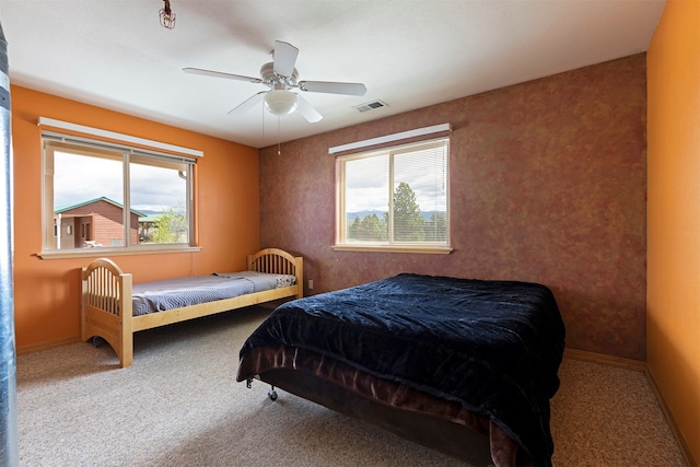 bedroom featuring carpet flooring and ceiling fan