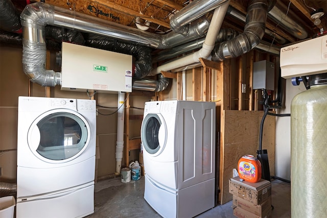 clothes washing area featuring washing machine and clothes dryer