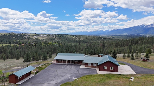 drone / aerial view featuring a mountain view