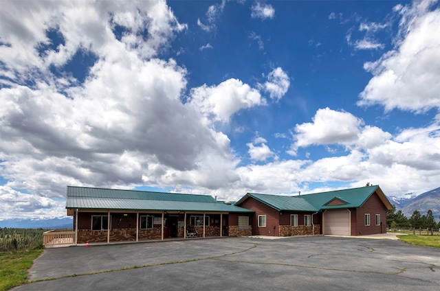 5282 Otto Way, Florence, MT 59833 - view of building exterior with driveway and a garage