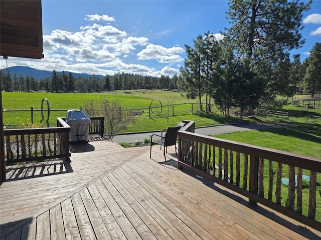 856 Weber Butte Trl, Corvallis, MT 59828 - wooden terrace with a lawn, a rural view, and a mountain view