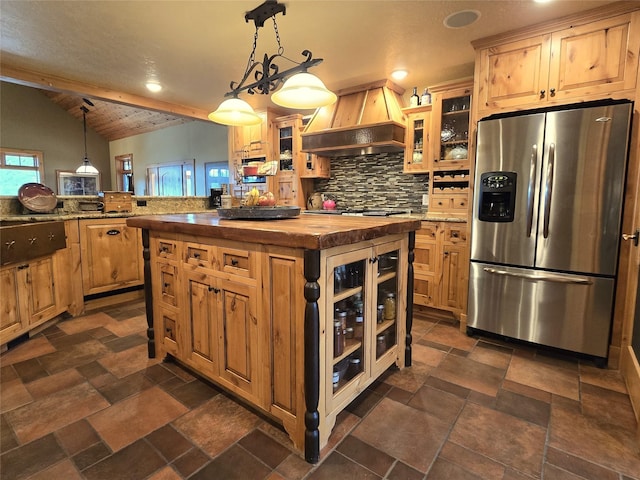 856 Weber Butte Trl, Corvallis, MT 59828 - kitchen with stainless steel appliances, wood counters, custom exhaust hood, decorative backsplash, and a kitchen island