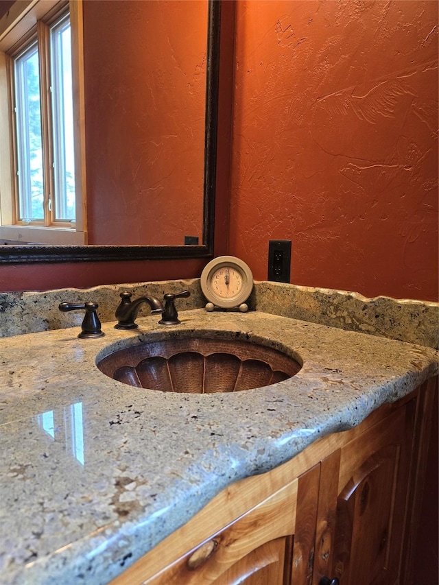 856 Weber Butte Trl, Corvallis, MT 59828 - bathroom with a textured wall and vanity