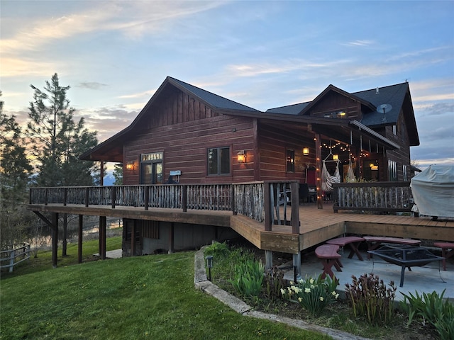 856 Weber Butte Trl, Corvallis, MT 59828 - back of house with a yard and a wooden deck