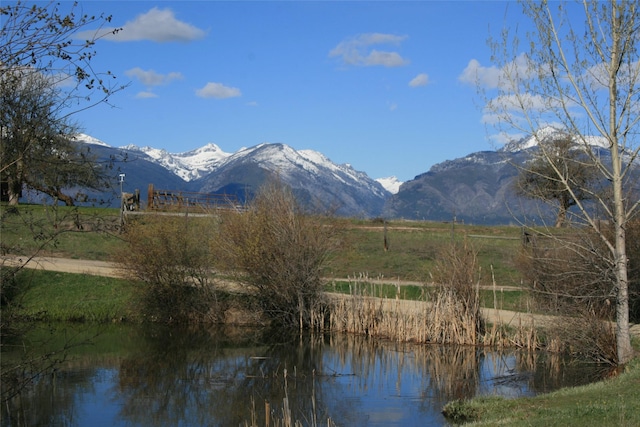 856 Weber Butte Trl, Corvallis, MT 59828 - view of mountain background featuring a nearby body of water