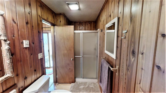 3653 Sophie Lake Rd, Eureka, MT 59917 - full bathroom with a stall shower and wood walls