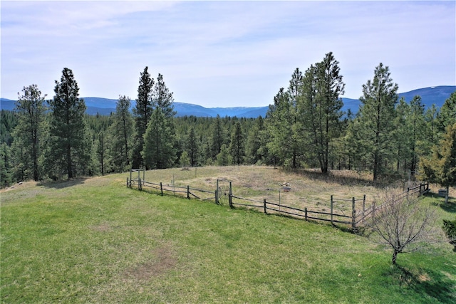 3653 Sophie Lake Rd, Eureka, MT 59917 - view of mountain backdrop featuring rural landscape and a forest