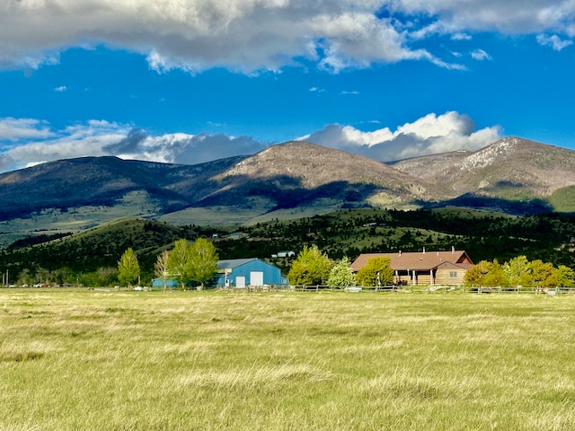 property view of mountains featuring a rural view