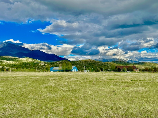 property view of mountains with a rural view